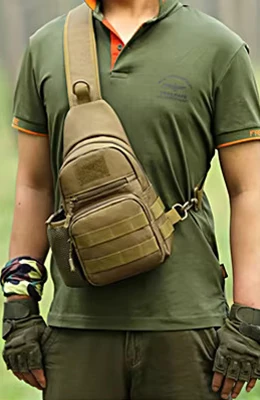 Tactical Sling Backpack Worn on the Chest for Accessibility Person wearing a tactical sling backpack on the chest, showcasing its compact design, MOLLE webbing, and versatility for tactical or outdoor use.
